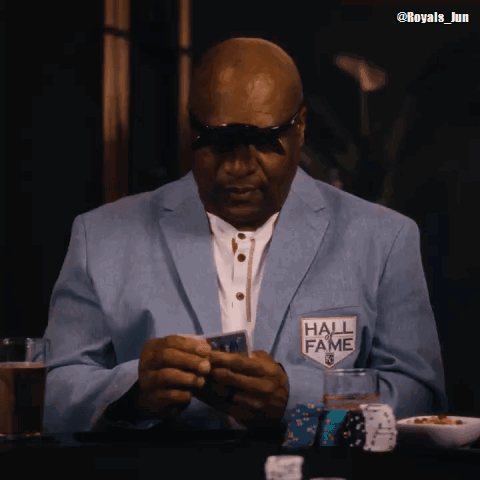 Man in Blue Jacket With Hall of Fame Patch