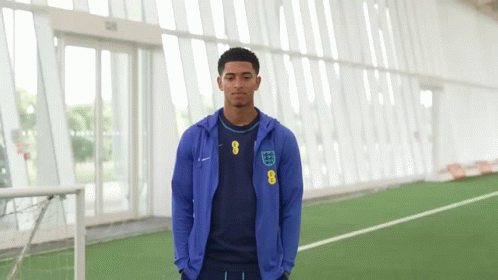 Man in Blue Jacket With Number 8