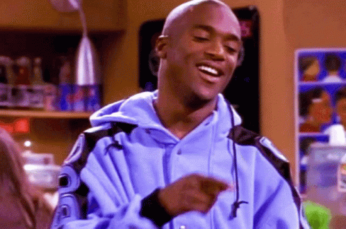 Man In Blue Jacket With 'R' On Sleeve GIF