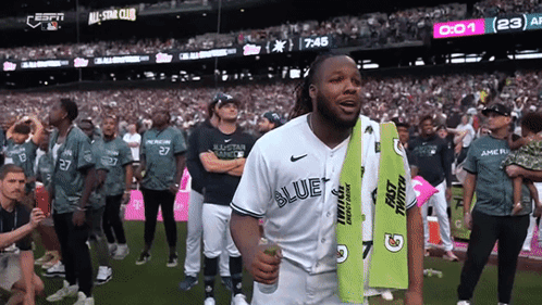 Man In Blue Jays Jersey Holding Green Gatorade Towel GIF