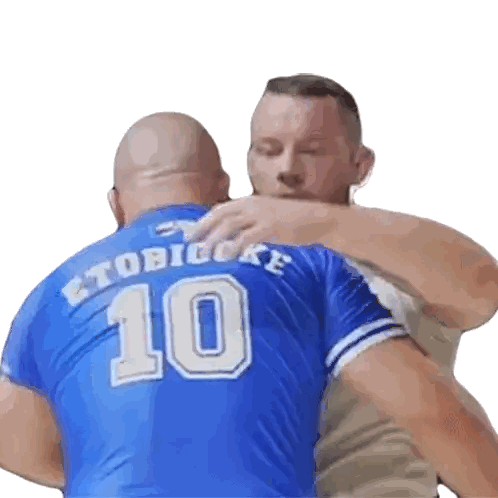 Man in Blue Jersey Hugging