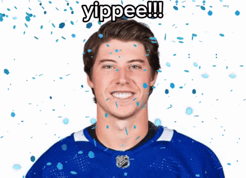 Man In Blue Jersey With Confetti Says Yippee GIF