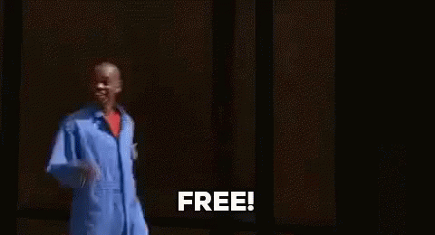 Man In Blue Jumpsuit Saying Free GIF