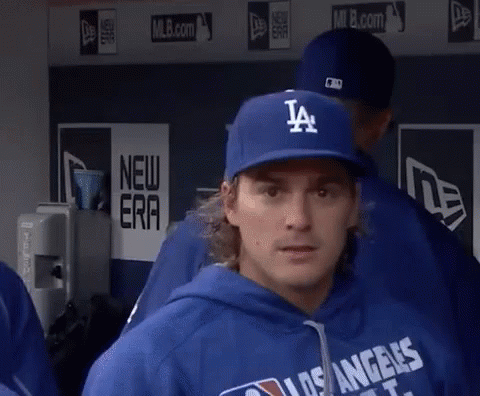 Man in Blue La Hat and Hoodie