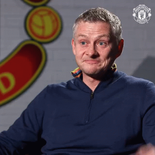 Man in Blue Manchester United Shirt