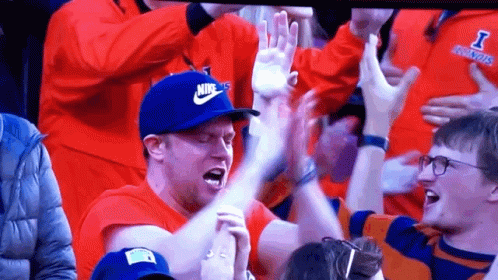 Man in Blue Nike Hat Screaming in Stands