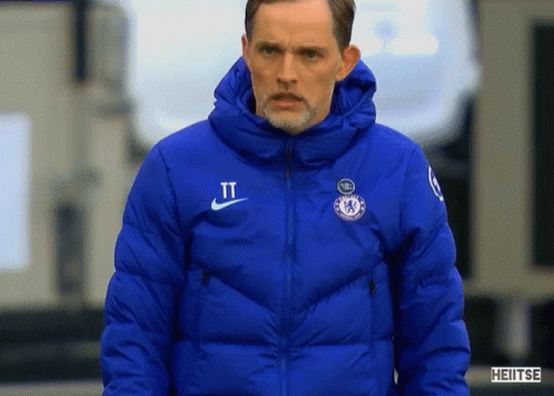 Man In Blue Nike Jacket With Letter T GIF