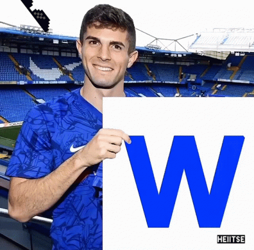 Man In Blue Nike Shirt Holding Sign W GIF