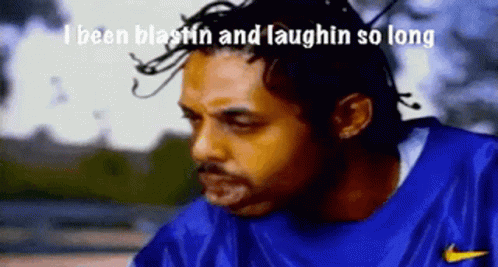 Man in Blue Nike Shirt Laughing