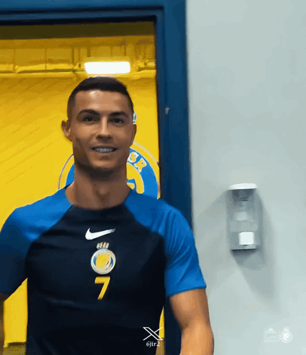 Man in Blue Nike Shirt Number 7