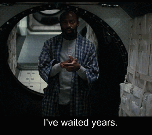 Man in Blue Plaid Shirt I've Waited Years