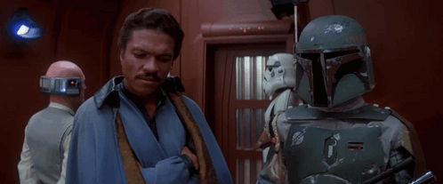 Man in Blue Robe Next to Storm Trooper