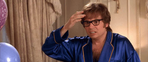 Man In Blue Robe Scratching Head GIF