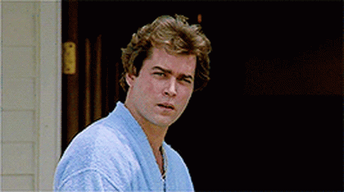 Man In Blue Robe Standing In Front Of House GIF