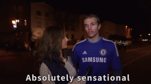 Man in Blue Samsung Shirt Talking to Woman