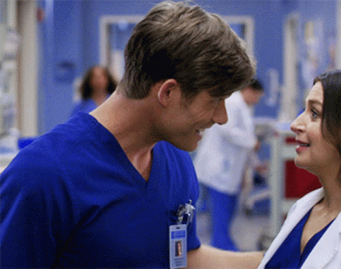 Man in Blue Scrub Top With Surgeon Name Tag