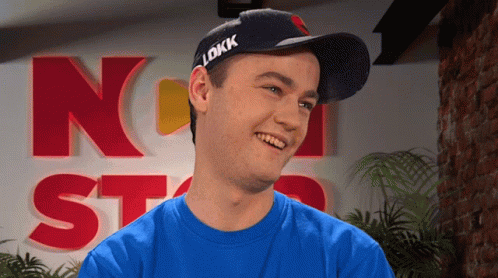 Man in Blue Shirt and Black Lokk Hat