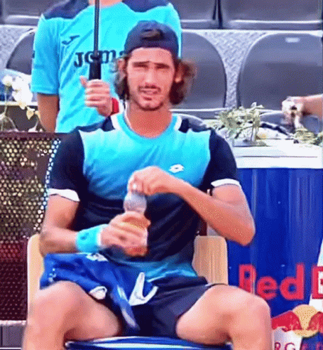 Man in Blue Shirt and Black Shorts