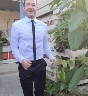 Man in Blue Shirt and Black Tie