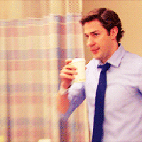 Man in Blue Shirt and Blue Tie Holding Coffee