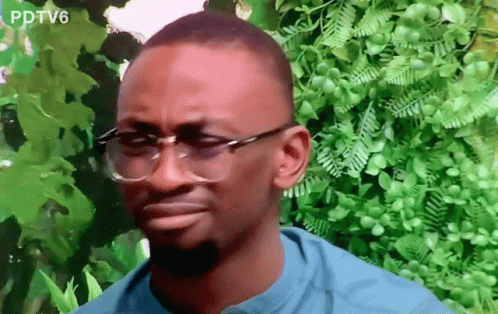 Man in Blue Shirt and Glasses