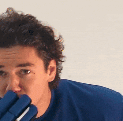 Man in Blue Shirt and Gloves