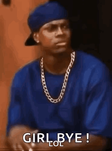 Man in Blue Shirt and Hat Hand on Chest