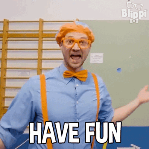 Man in Blue Shirt and Orange Suspenders Saying Have Fun