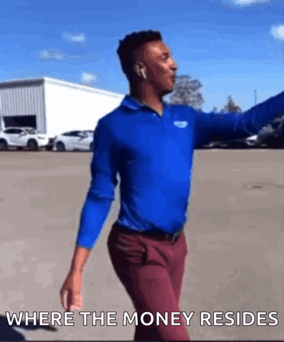 Man In Blue Shirt And Red Pants Dancing Where The Money Resides GIF