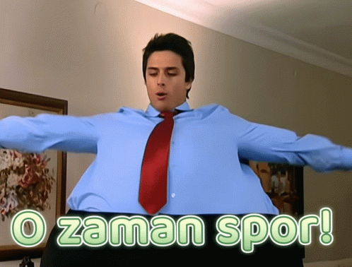 Man in Blue Shirt and Red Tie O Zaman Spor