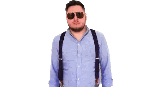 Man in Blue Shirt and Suspenders Shrugging