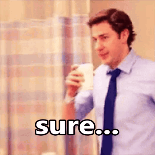 Man In Blue Shirt And Tie Holding Coffee GIF
