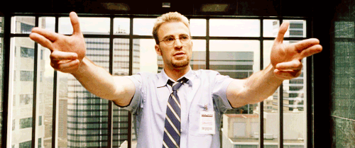 Man In Blue Shirt And Tie With Chris Evans Name Tag GIF