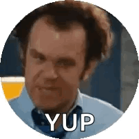 Man in Blue Shirt and Tie with Yup