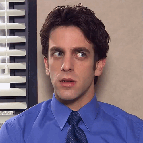 Man in Blue Shirt and Tie