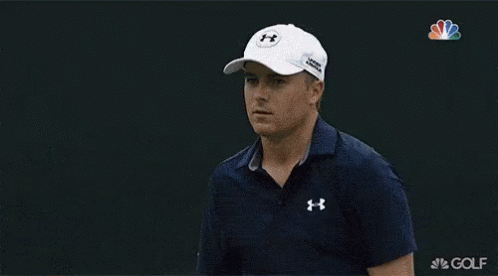 Man In Blue Shirt And White Hat Celebrating With Golf Club GIF