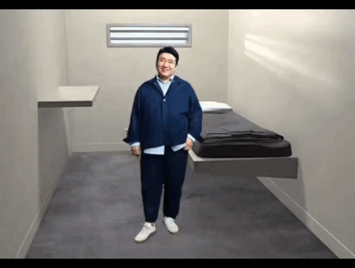 Man In Blue Shirt And White Shoes GIF