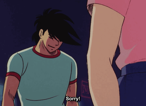 Man in Blue Shirt Apologizing to Woman