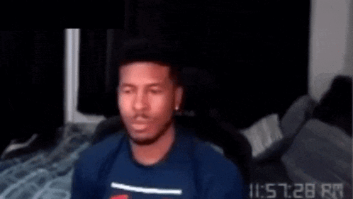 Man in Blue Shirt at Computer Screen 11:53