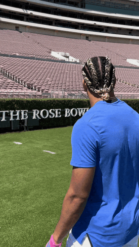 Man in Blue Shirt at Rose Bowl