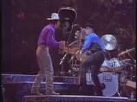 Man In Blue Shirt By Stove GIF