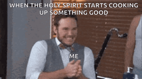Man in Blue Shirt Clapping and Smiling