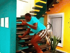 Man In Blue Shirt Climbing Stairs GIF