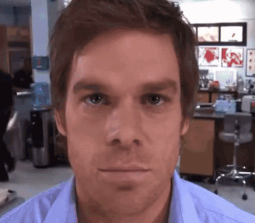 Man in Blue Shirt Close Up