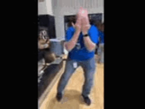 Man In Blue Shirt Dancing And Clapping GIF