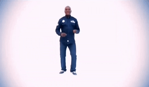 Man in Blue Shirt Dancing