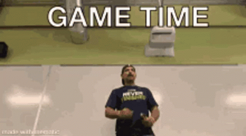 Man in Blue Shirt Dancing Game Time