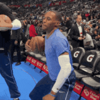 Man In Blue Shirt Dancing In Front Of Crowd GIF