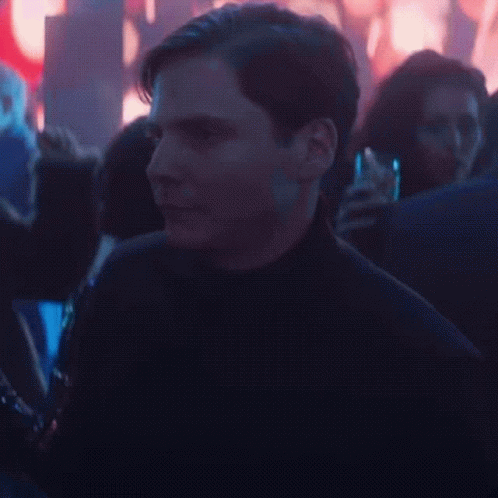 Man in Blue Shirt Dancing
