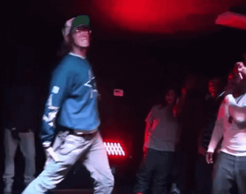 Man In Blue Shirt Dancing On Stage GIF